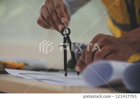 Image of engineer meeting for architectural project. working with partner and engineering tools on workplace vintage tone. 121437765