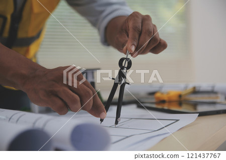 Image of engineer meeting for architectural project. working with partner and engineering tools on workplace vintage tone. 121437767