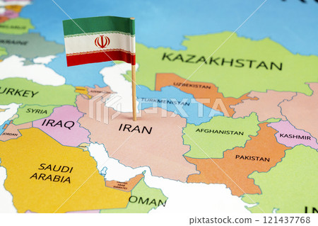A map of Iran with the national flag of Iran on it. The flag is green, white, and red tricolor. Along the stripes' edges is the Takbir and in center is national emblem A map of Iran with the national flag of Iran on it. The flag is green, white, and red tricolor. Along the stripes' edges is the Takbir and in center is national emblem 121437768
