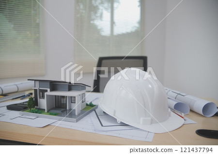 Architects, engineers, contractors working in the office with blueprints, inspection engineers Work analysis for architectural plan, construction project sketch, focus, business construction concept. 121437794