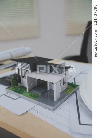 Architects, engineers, contractors working in the office with blueprints, inspection engineers Work analysis for architectural plan, construction project sketch, focus, business construction concept. 121437796