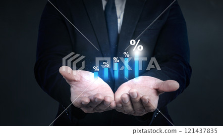 Business hand shows an increase chart with a percentage symbol on his palm 121437835