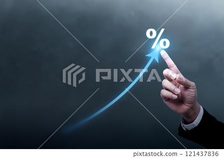 Business hand shows an arrow pointing up with a percentage symbol 121437836