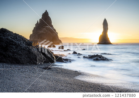 View of Black Sand Beach of Reynisfjara and Reynisdrangar Sea stacks in the Vik View of Black Sand Beach of Reynisfjara and Reynisdrangar Sea stacks in the Vik 121437880