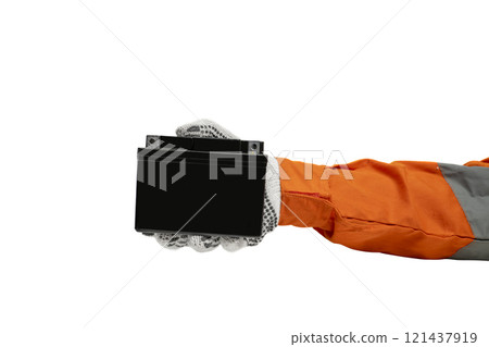 Mechanic hand in glove holding black motorcycle battery isolated over white background 121437919