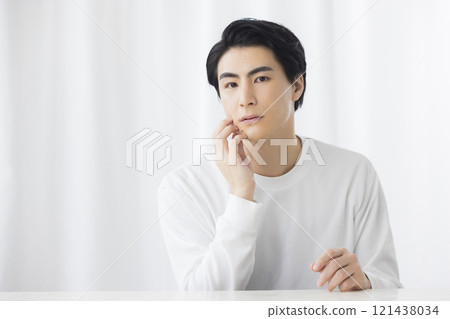 Thinking young man Thinking young man 121438034