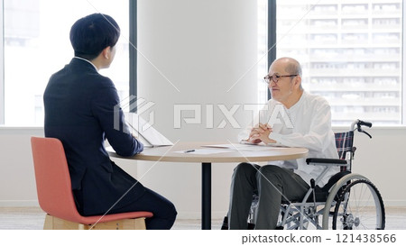 Elderly people receiving sales from businessmen 121438566