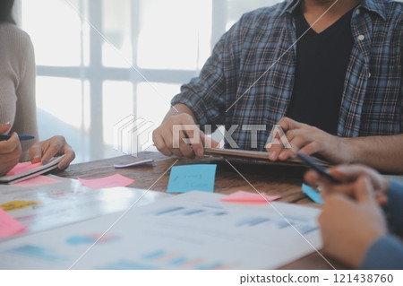 Team of business people working together in the meeting room office, teamwork background charts and graphs banner, double exposure successful teamwork,business planning concept. 121438760