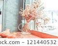 Dried flowers by the window 121440532