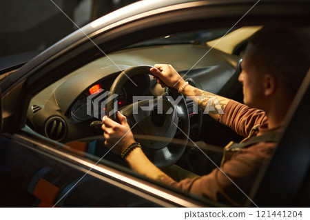 Mechanic Checking The Work Of Engine 121441204