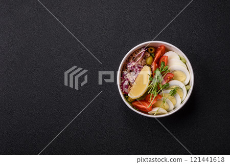 Salad with tuna pieces, boiled egg, cherry tomatoes, lettuce 121441618