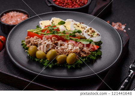 Salad with tuna pieces, boiled egg, cherry tomatoes, lettuce Salad with tuna pieces, boiled egg, cherry tomatoes, lettuce 121441648
