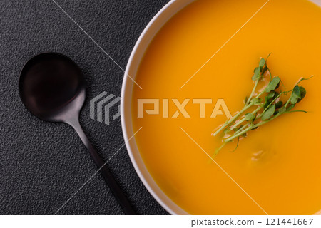 Cream soup of pumpkin, zucchini and carrots with salt and spices Cream soup of pumpkin, zucchini and carrots with salt and spices 121441667