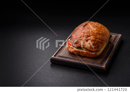 Ciabata with jamon or prosciutto, tomatoes, cheese and lettuce 121441720