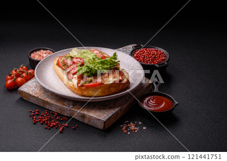 Ciabata with jamon or prosciutto, tomatoes, cheese and lettuce Ciabata with jamon or prosciutto, tomatoes, cheese and lettuce 121441751
