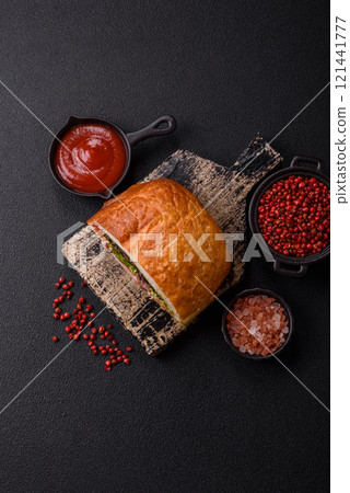 Ciabata with jamon or prosciutto, tomatoes, cheese and lettuce Ciabata with jamon or prosciutto, tomatoes, cheese and lettuce 121441777