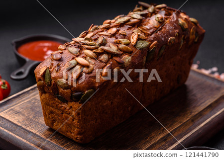 Brown bread with seeds, grains, salt and spices 121441790