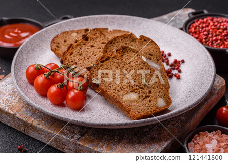 Brown bread with seeds, grains, salt and spices Brown bread with seeds, grains, salt and spices 121441800