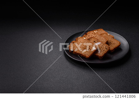 Brown bread with seeds, grains, salt and spices Brown bread with seeds, grains, salt and spices 121441806