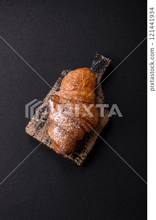 Delicious crispy sweet croissant with chocolate Delicious crispy sweet croissant with chocolate 121441934