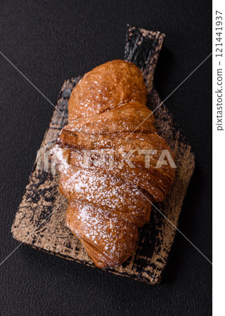 Delicious crispy sweet croissant with chocolate Delicious crispy sweet croissant with chocolate 121441937
