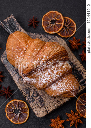 Delicious crispy sweet croissant with chocolate 121441940