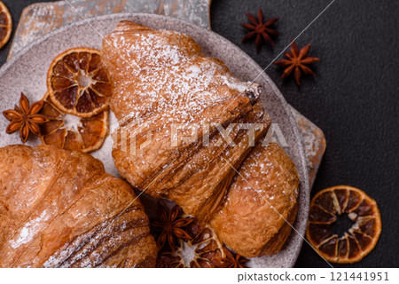 Delicious crispy sweet croissant with chocolate 121441951