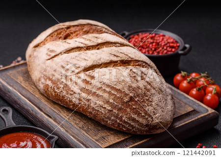 Brown bread with seeds, grains, salt and spices Brown bread with seeds, grains, salt and spices 121442091