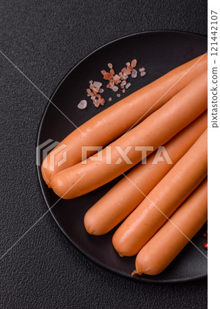 Delicious fresh vegetarian sausage or sausage made from vegetable protein tofu or seitan legumes 121442107