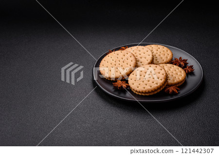 Round dotted snack snack cookies with cream Round dotted snack snack cookies with cream 121442307