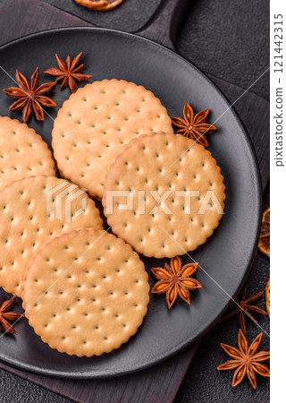 Round dotted snack snack cookies with cream Round dotted snack snack cookies with cream 121442315