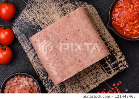 Delicious canned pink spiced ham or spam with salt, spices and herbs Delicious canned pink spiced ham or spam with salt, spices and herbs 121442465