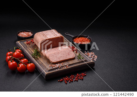 Delicious canned pink spiced ham or spam with salt, spices and herbs Delicious canned pink spiced ham or spam with salt, spices and herbs 121442490