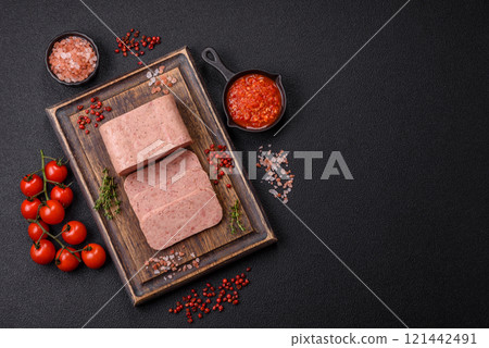 Delicious canned pink spiced ham or spam with salt, spices and herbs Delicious canned pink spiced ham or spam with salt, spices and herbs 121442491