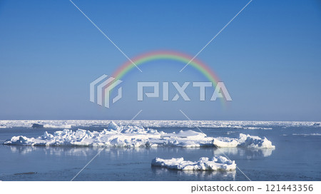 A winter spectacle: a rainbow over the source of drift ice in the Sea of Okhotsk 121443356