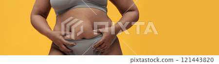 Body Positive Woman Touching Her Belly Body Positive Woman Touching Her Belly 121443820