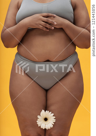 Body Positive Woman With Flower In Her Legs 121443856