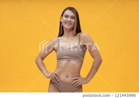 Beautiful Young Woman Posing At Camera Beautiful Young Woman Posing At Camera 121443990