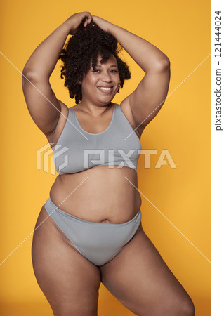 Body Positive Woman Posing At Camera Body Positive Woman Posing At Camera 121444024