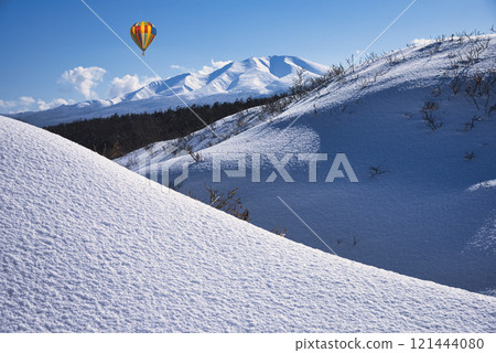 Balloons floating above the snowy fields of Eastern Hokkaido 121444080