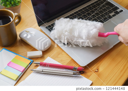 Clean the laptop on your desk with a handy mop 121444148