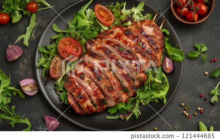 Grilled chicken meat with salad on a plate, barbecue dinner 121444685