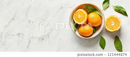 Orange in a bowl on rustic background with copyspace 121444874