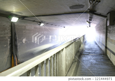 Underpass where vehicles run. 121444971