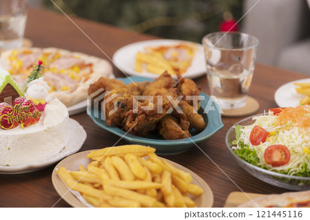 A sumptuous meal on the table at a Christmas party A sumptuous meal on the table at a Christmas party 121445116