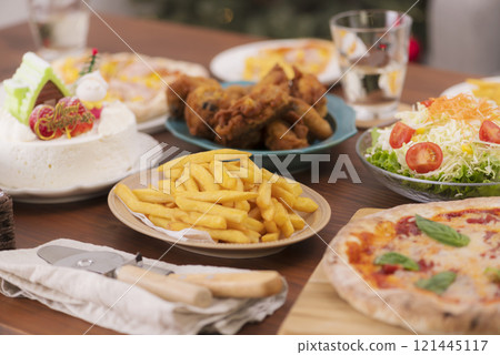 A sumptuous meal on the table at a Christmas party A sumptuous meal on the table at a Christmas party 121445117