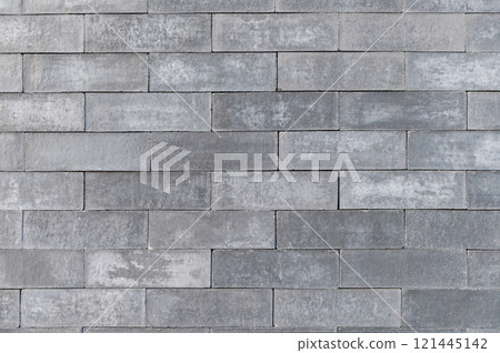 Grey brick wall texture background 121445142