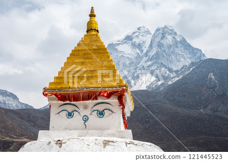 Ancient Tibetan Buddhist stupa with beautiful view of Mt.Ama Dablam located in Dingboche village Nepal. 121445523