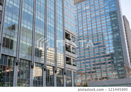 Landscape of the office town looking up at a skyscraper Landscape of the office town looking up at a skyscraper 121445995