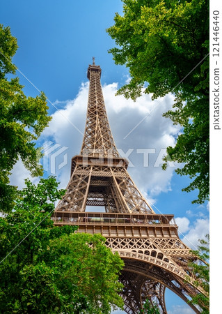 A Stunning View Of The Eiffel Tower Rising Through Lush Green Trees In Beautiful Paris, France 121446440
